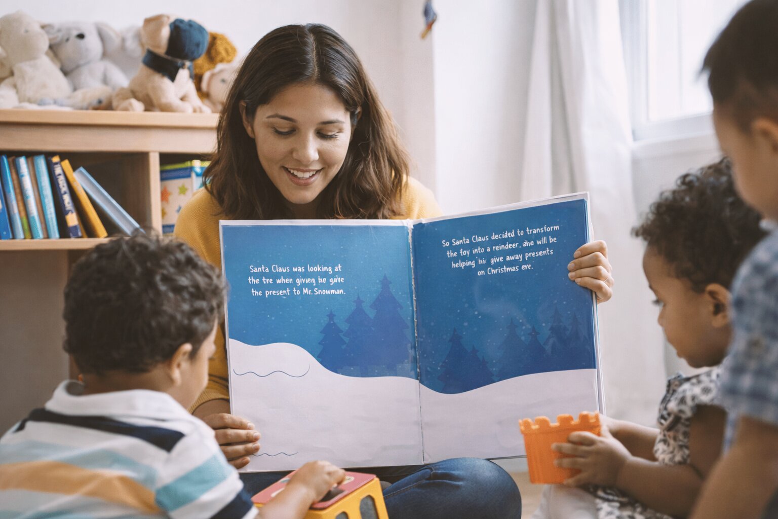 Teacher reading a story with children